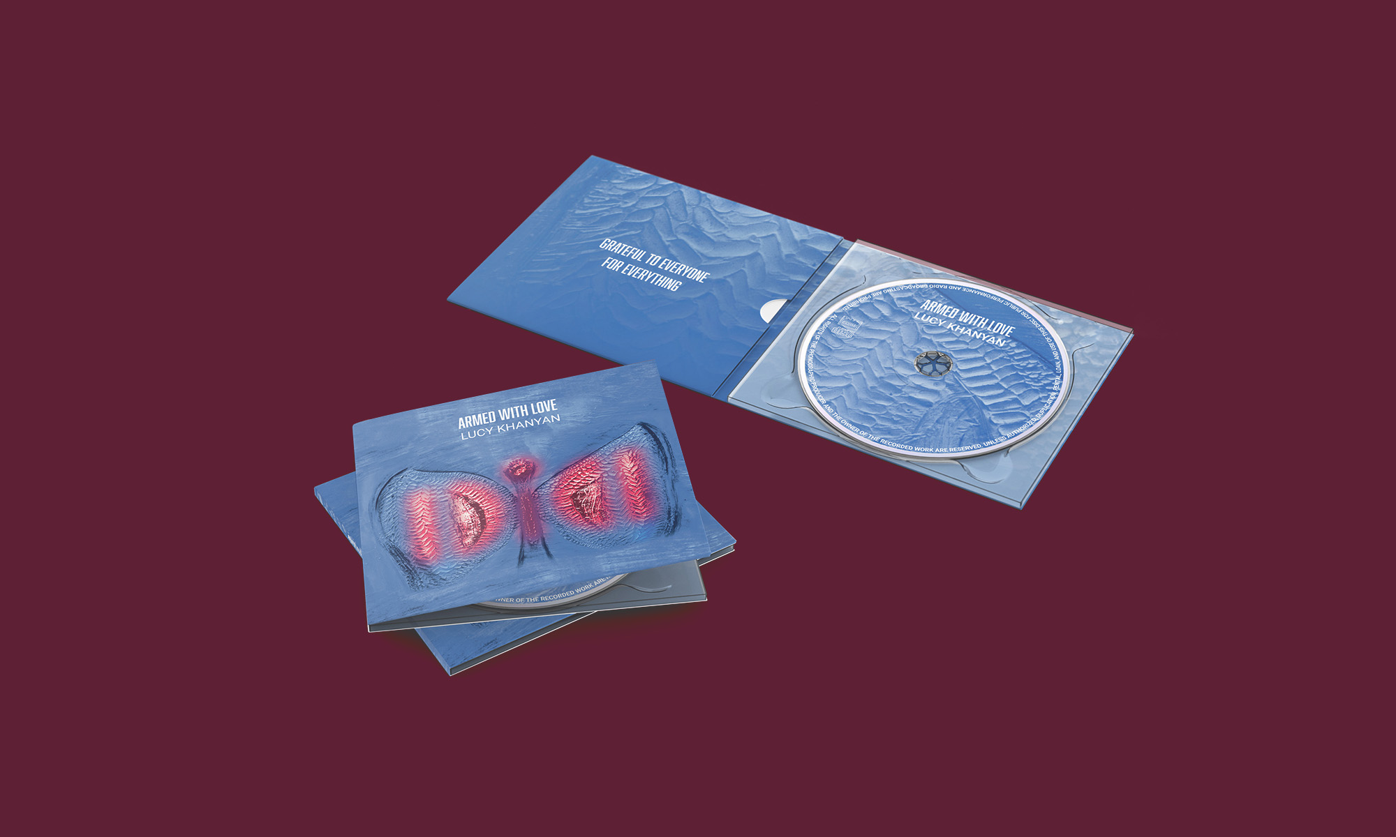 Digipack ouvert album Armed with Love Lucy Khanyan - direction artistique Thibaut Abadie Garcia